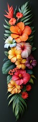 Obraz premium Close-up of a vibrant bouquet of tropical flowers and leaves against a black background.