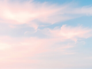 Obraz premium Soft pastel clouds drift across a serene sky at dawn, creating a calming atmosphere for morning inspiration