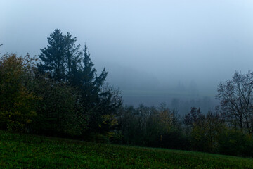 Fog outside the city on a cloudy autumn day in Bavaria.