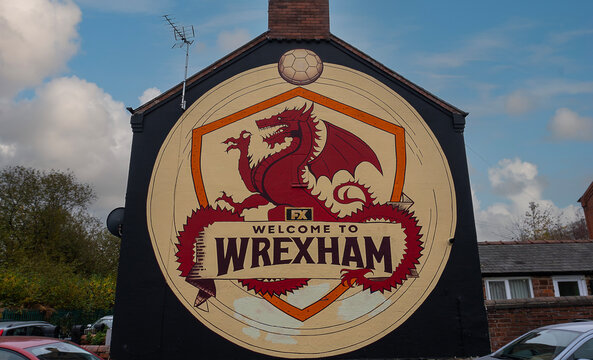The "Welcome to Wrexham" mural on the exterior wall of a row of houses in Wrexham, Wales