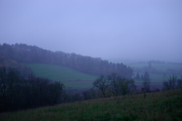 Fog outside the city on a cloudy autumn day in Bavaria.