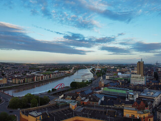 Fototapeta premium High Angle View of Newport City on River Usk Wales, United Kingdom During Sunset. Aerial Footage Was Captured with Drone's Camera on May 27th, 2024