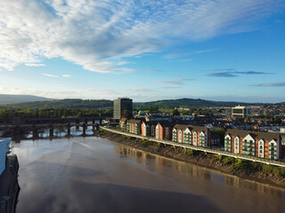 Obraz premium High Angle View of Newport City on River Usk Wales, United Kingdom During Sunset. Aerial Footage Was Captured with Drone's Camera on May 27th, 2024