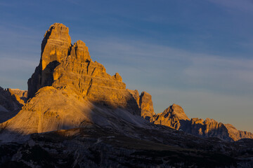 Tre Cime di Lavaredo in the Dolomites popular mountain group known for its distinct, towering peaks. Ideal for photography, with dramatic landscapes, rugged terrain, and scenic alpine views.