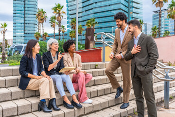 Fototapeta premium Relaxed and informal business meeting in an outdoor stairs