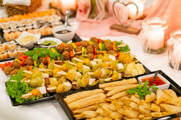 Table with snacks at a wedding buffet