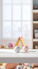Soft Pastel Colored Balls on Minimalist Table with Brightly Lit Background in a Cozy Playroom Setting for Creative and Educational Concepts