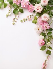 Pink roses and other flowers arranged on a white background. Delicate and romantic.