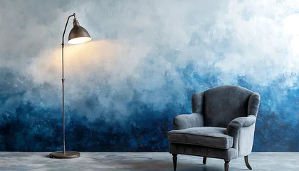 Selbstklebende Fototapeten Living room featuring a gray armchair and standing lamp against a blue and white ombre wall. Modern elegance. © Hasnain Arts