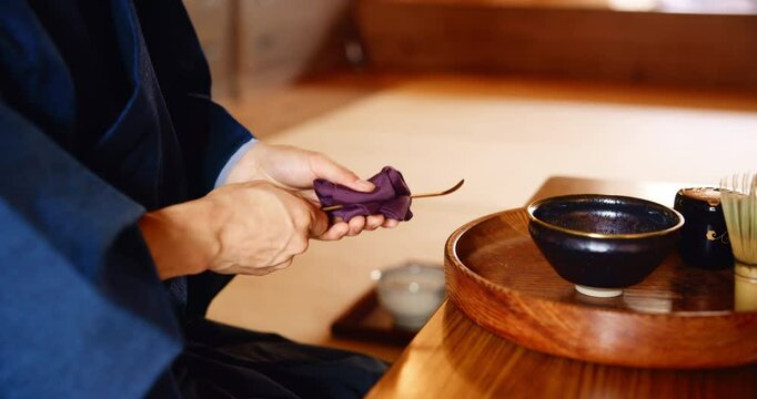 Japanese, cleaning and person in tea room, hands and drinking ritual with culture, traditional and routine. House, closeup and wellness with detox, indigenous herbs and zen with peace and morning