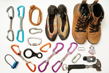 climbing and mountaineering equipment on white background