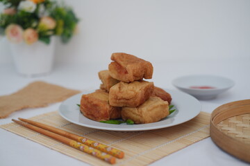 Tahu Bakso, Indonesian traditional snack made from tofu and beef. Served in white plate.