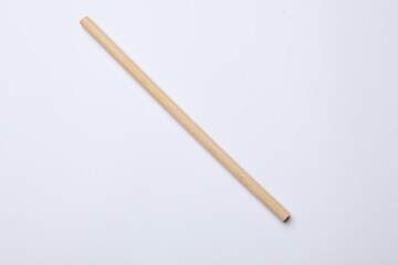 One bamboo drinking straw on white background, top view