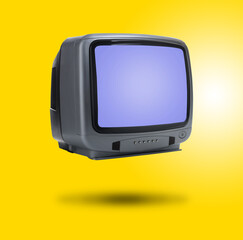 Retro TV set in air on golden background