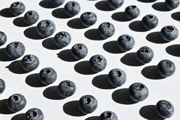 Blueberry background arranged with strong shadows