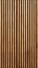 Fototapeta premium A close-up view of vertical wooden slats, showcasing texture and natural patterns.
