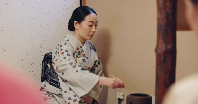 Woman, tea ceremony and container with matcha mix for process at Japanese tradition with culture, wellness and tools. Bowl, ceramic and service for traditional detox, health and green drink custom