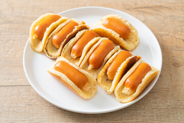 flat pancake roll with sausage
