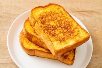 french toast on white plate