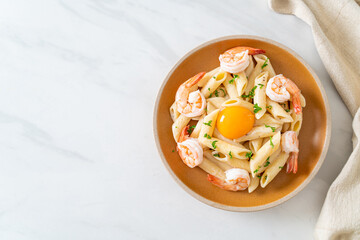 penne pasta white cream sauce with shrimps and egg