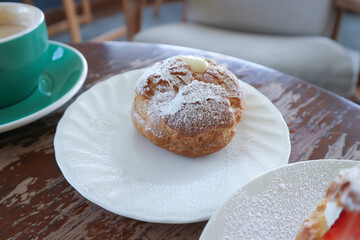 choux cream or cream puff, eclair and coffee