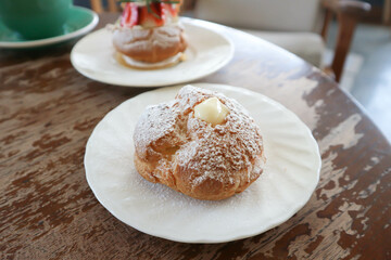 choux cream or cream puff, eclair and coffee
