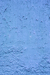 Vertical photo of plaster on the wall.