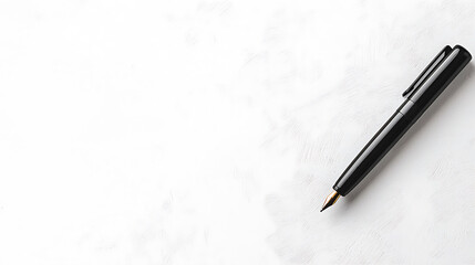 sleek black ballpoint pen rests on clean white background, perfect for writing or drawing. Its elegant design adds touch of sophistication to any workspace