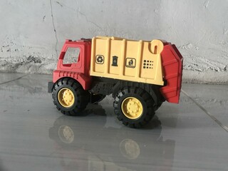 Toy Garbage Truck Isolated on White with reflek photo
