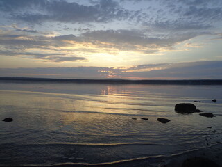 Fototapeta premium end of sunrise on the new england coast during the summer 