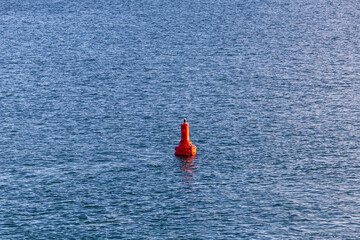 Bright Red Buoy Floating in the Serene Gulf Islands Waters