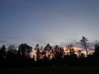 Pink and blue sky during a summer sunset 