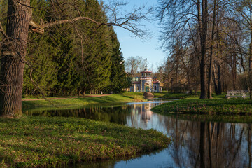 Chinese gazebo on the bank of the Upper Ponds in the Catherine Park in Tsarskoye Selo on a sunny spring day, Pushkin, St. Petersburg, Russia
