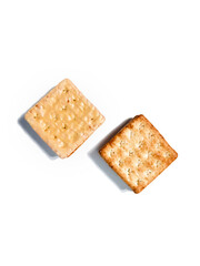 Crispy cracker with a sprinkle of sugar and the other side with full of cheese coating. The taste is sweet. Isolated on a white background