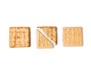 Crispy cracker with a sprinkle of sugar and the other side with full of cheese coating. The taste is sweet. Isolated on a white background