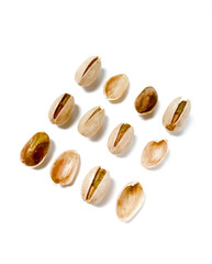 Close up of Pistachio nuts on isolated white background