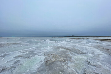 Gloomy windy weather on salt Lake Baskunchak