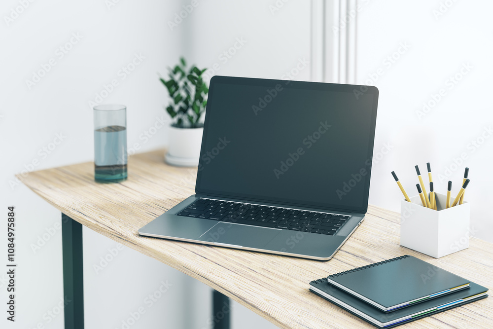 Poster perspective view on blank dark modern laptop monitor with copyspace for your logo or text on wooden 