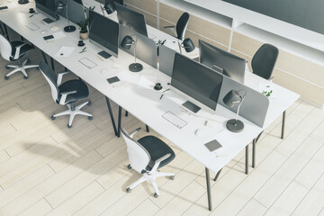 Top view on minimalistic style raw of workplaces with modern computers, white tables and light wooden floor in sunny coworking office. 3D rendering
