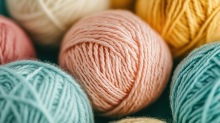 Brightly colored knitting yarn balls are closely arranged, showcasing a variety of textures and hues for crafting and design inspiration