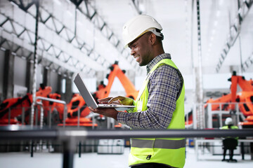 Worker In Automotive Car Factory