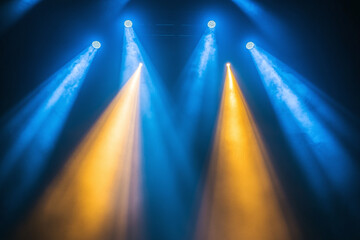 Vibrant Stage Lighting with Blue and Orange Beams, Fog Effects, and Dramatic Lighting for Concert and Event Performance