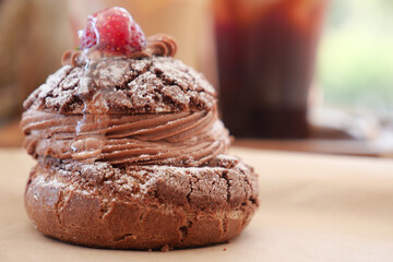 A Delightfully Delicious Chocolate Pastry That Is Perfectly Finished Off with Raspberry Topping