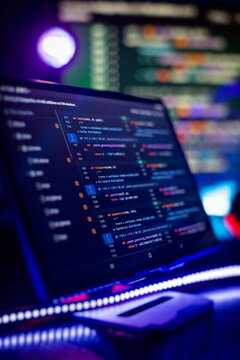 IT business.Monitor closeup of function source code. Project managers work new idea.