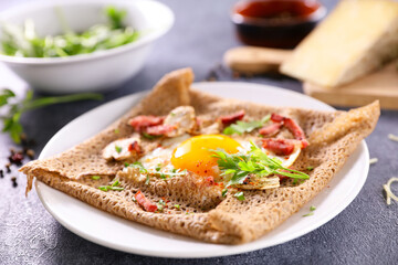 buckwheat crepe with egg, cream and bacon