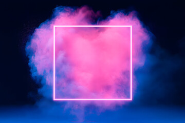 Pink neon powder explosion with gliwing frame on blue background. Colored cloud. Colorful dust explode. Paint Holi.