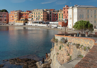 View from rock on Bay of Silence, fishing cove of town of Sestra Levante, Italy. Autumn, 2024. Tourism and recreation. Ecologically clean nature. Traditional old buildings. Historical center.