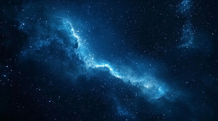 A stunning view of a vibrant blue nebula glowing in the vastness of outer space at night