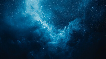 Fototapeta premium A breathtaking view of the night sky filled with stars and cosmic clouds in deep blue tones