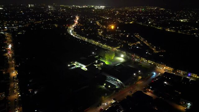 Aerial Footage of Illuminated Luton City, Barton Road A6 at Cold Night. High Angle View was Captured During Rainy and Cloudy Night over England UK. Captured with Drone's Camera on November 16th, 2024